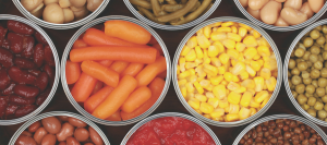 Carrots, corn, beans, and other food in jars