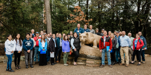 Conference attendees at the Penn State lion shrine after the Rec Hall walkthrough